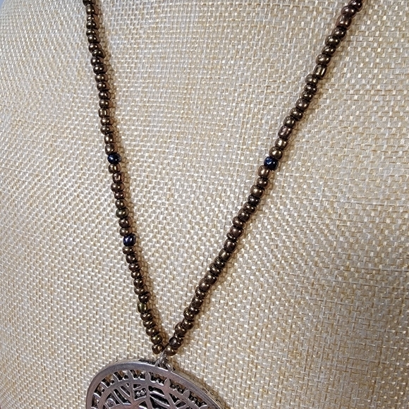 Beaded Necklace with Metal Pendant - Picture 7 of 17